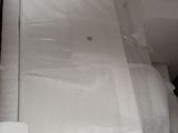 a picture of a bed that has been wrapped in plastic