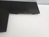 a laptop computer sitting on top of a white desk
