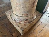 a vase that is sitting on top of a wooden table
