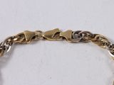 an image of a close up of a bracelet on a white surface