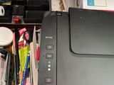 an image of a printer sitting on top of a desk