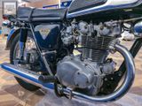 a close up of a motorcycle on display at a show