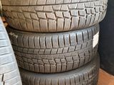 four tires stacked on top of each other on a table