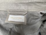 a close up of the label on the back of a jacket