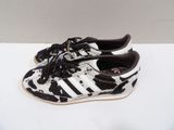 zebra print adidas sneakers with black and white stripes on the sole