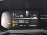 the dashboard of a car with a digital display showing the speed of the car