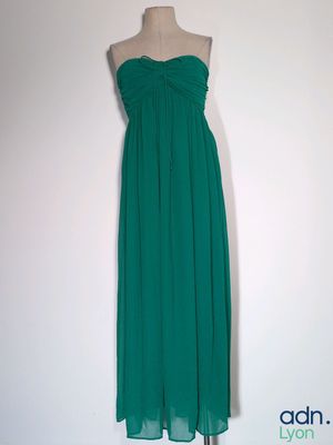 green strapless dress on a mannequin mannequin mannequin mannequin mannequin mannequin mannequin mannequin manne