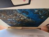 a picture of a painting being displayed in a box