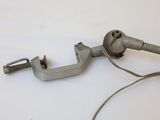 a metal clamp with a wire attached to it