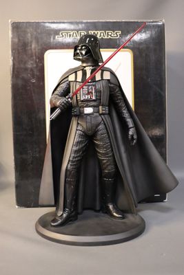 darth vader figurine from the star wars movie