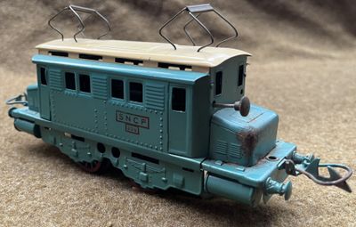 a toy train that is sitting on the ground