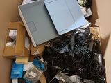 a box full of electronics and a laptop in it