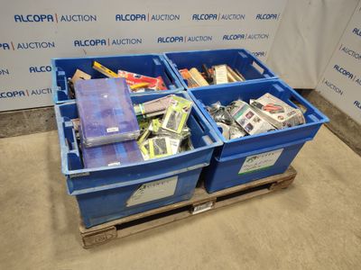 two blue bins filled with assorted items on a pallet
