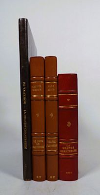 three books that are sitting next to each other on a table
