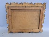 an old wooden picture frame with a picture of a bird on it
