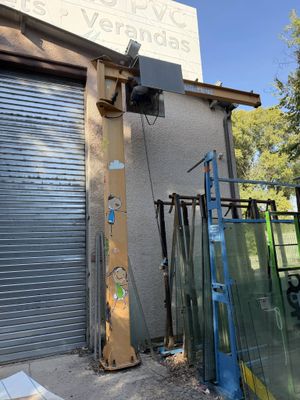 a building with a lot of glass doors outside of it