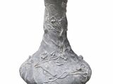 a statue of a dress on a vase on a white background