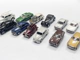 a lot of toy cars that are lined up together
