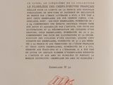 the back cover of a book with a red ink drawing on it