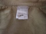 a close up of a label on a shirt