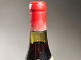 a bottle of wine that is sitting on a table