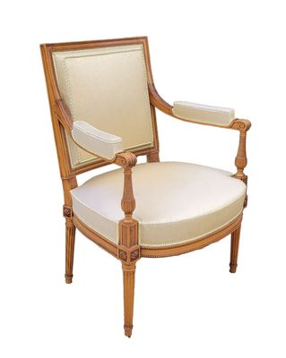 an image of a wooden chair with a white upholstered seat