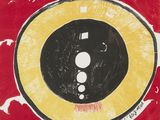 une image représentant un tableau sur lequel figure un cercle jaune et noir sur fond rouge