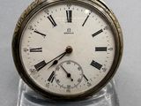 a clock with roman numerals on the face of it