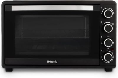 the black toaster oven is on a white surface with the door open