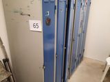 several lockers are lined up in a row in a room