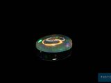 an image of a glowing disc in the dark