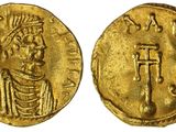 une pièce d'or portant l'image d'un homme