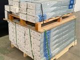 a stack of boxes sitting on a pallet in a warehouse
