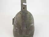 a helmet that is sitting on a white surface