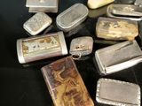 many different types of lighters on the table