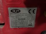 an image of a red machine that is sitting on a table