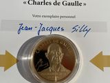 a picture of a gold coin with a picture of a man on it