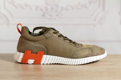 a close up of a pair of sneakers on a table