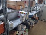 many boxes and boxes on the shelves in the room