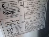 a label on the side of a stainless steel refrigerator