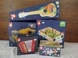 three boxes of musical instruments on a table