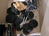 a box with a bunch of buttons and other items in it