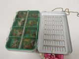 a metal box with many different types of flies in it