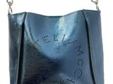 blue leather handbag with eyelets on the front and shoulder strap