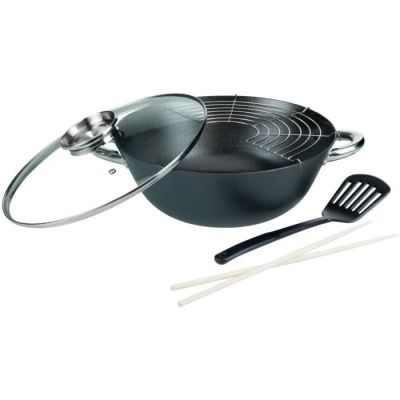 une image représentant une poêle avec un couvercle et une spatule à côté