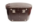 a brown leather suitcase with metal handles on a white background