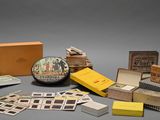 many different boxes and boxes with pictures on them