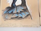a drawing of a woman in a blue dress sitting on the ground