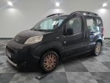 a picture of a small black van parked in a garage