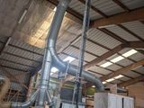 a large machine that is sitting inside of a building